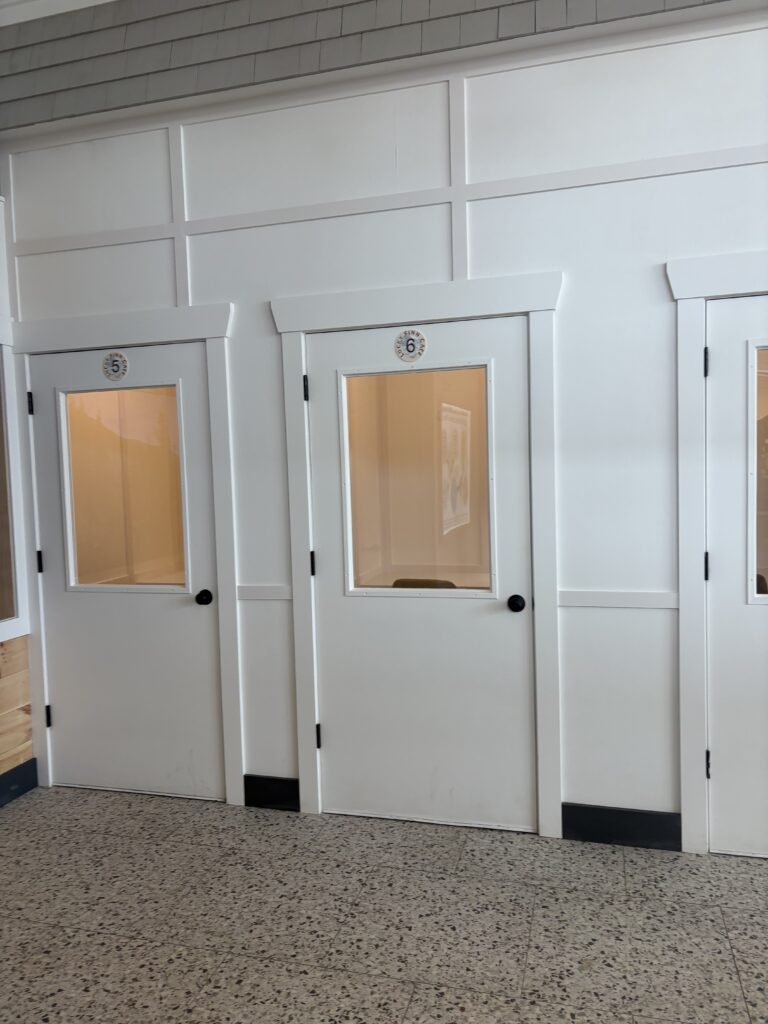 The two office doors in the main café area at Lucky Finn Cafe