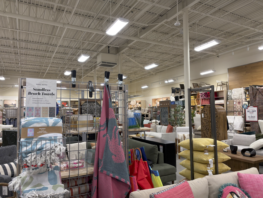 The store has a lot of merchandise including furniture which can make it the store feel disorganized