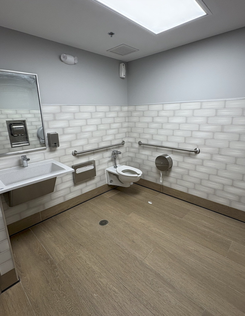 The bathroom was clean and has grab bars on the walls for accessibility 